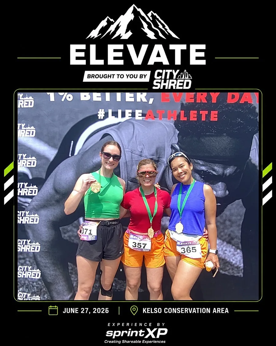 Three runners smiling for a SprintXP event photo